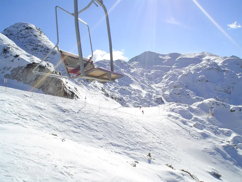 Chairlift and snow-covered slopes at Vogel